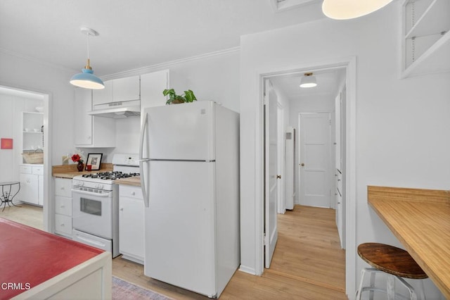 901 Drown Ave, Ojai, CA 93023 - kitchen featuring white appliances, under cabinet range hood, white cabinets, light wood-style floors, and light countertops