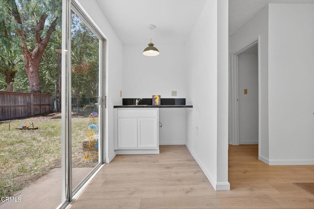 901 Drown Ave, Ojai, CA 93023 - bar with light wood finished floors and decorative light fixtures