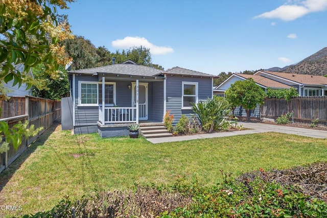 901 Drown Ave, Ojai, CA 93023 - bungalow with covered porch, a fenced backyard, a mountain view, and a shingled roof
