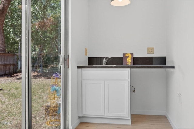 901 Drown Ave, Ojai, CA 93023 - bathroom featuring healthy amount of natural light, wood finished floors, and vanity
