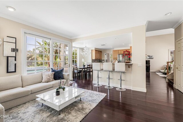 1449 La Culebra Cir, Camarillo, CA 93012 - living area with dark wood-type flooring, a chandelier, ornamental molding, and recessed lighting