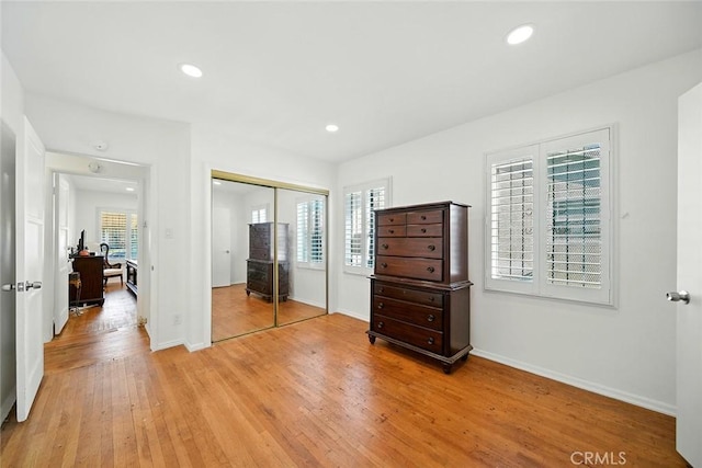 957 W Myrrh St, Compton, CA 90220 - bedroom featuring light wood-style flooring, a closet, recessed lighting, and a desk