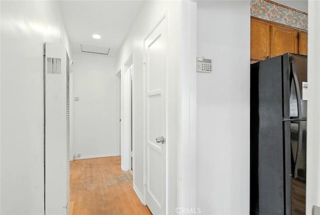 957 W Myrrh St, Compton, CA 90220 - corridor featuring a heating unit, light wood-style flooring, attic access, and recessed lighting