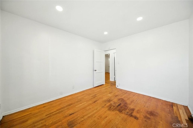 957 W Myrrh St, Compton, CA 90220 - unfurnished room featuring wood finished floors and recessed lighting