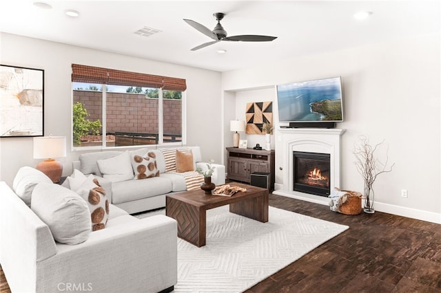 11810 Sanderling Way, Jurupa Valley, CA 91752 - living area featuring wood finished floors, ceiling fan, a glass covered fireplace, and recessed lighting