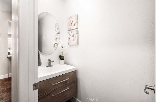 11810 Sanderling Way, Jurupa Valley, CA 91752 - bathroom with vanity and wood finished floors