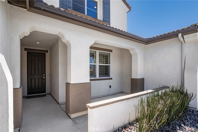 11810 Sanderling Way, Jurupa Valley, CA 91752 - doorway to property featuring stucco siding