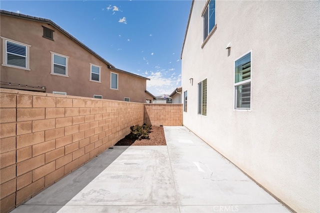11810 Sanderling Way, Jurupa Valley, CA 91752 - fenced backyard with a patio area