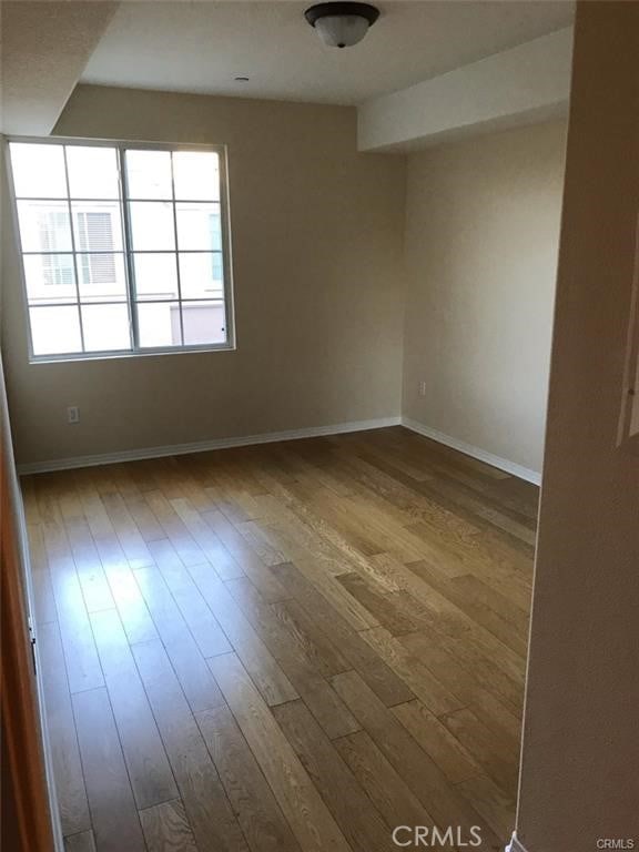 2750 Artesia Blvd Unit 341, Redondo Beach, CA 90278 - empty room with hardwood / wood-style floors