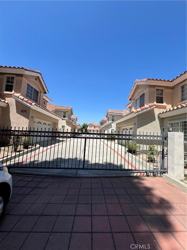 12143 Ferris Rd, El Monte, CA 91732 - gate featuring a residential view