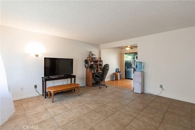 123 Olive St, Paso Robles, CA 93446 - home office with light tile patterned flooring, ceiling fan, and a textured ceiling