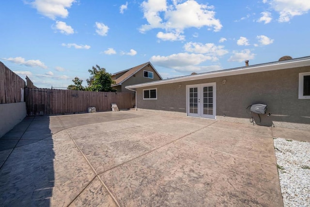 1203 Fifth Ave, Chula Vista, CA 91911 - rear view of property with french doors, a patio area, and stucco siding