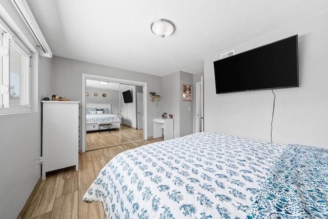 1203 Fifth Ave, Chula Vista, CA 91911 - bedroom with light wood-style flooring and baseboards