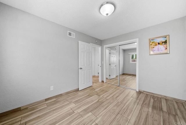 1203 Fifth Ave, Chula Vista, CA 91911 - unfurnished bedroom featuring wood finished floors and a closet