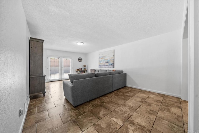 1203 Fifth Ave, Chula Vista, CA 91911 - living area with a textured ceiling and baseboards