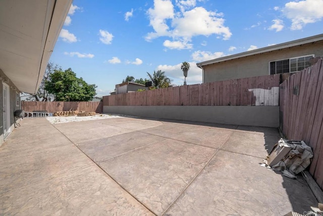 1203 Fifth Ave, Chula Vista, CA 91911 - fenced backyard featuring a patio area