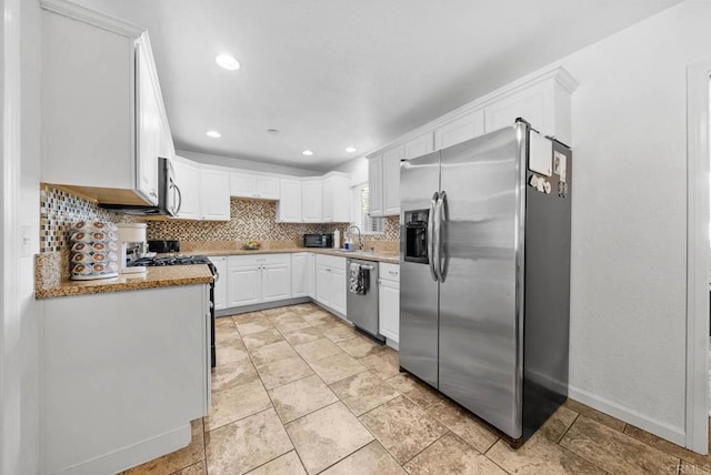 1203 Fifth Ave, Chula Vista, CA 91911 - kitchen with appliances with stainless steel finishes, tasteful backsplash, white cabinetry, and recessed lighting