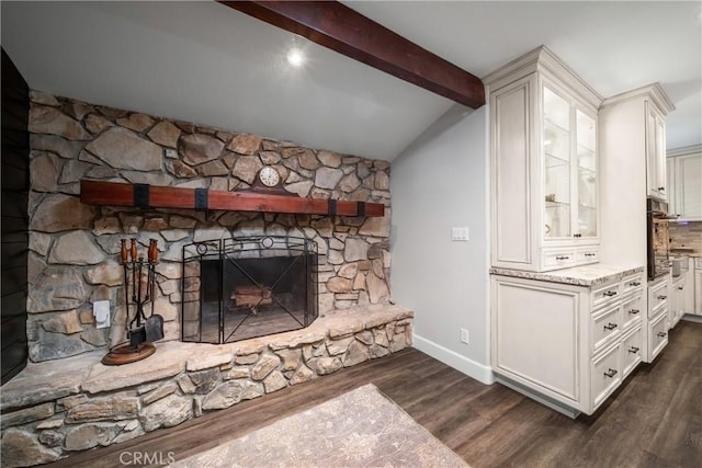 780 S Briargate Ln, Covina, CA 91723 - detailed view of beamed ceiling, wood finished floors, a fireplace, and tasteful backsplash