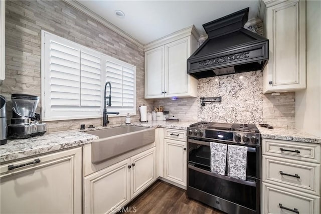 780 S Briargate Ln, Covina, CA 91723 - kitchen featuring double oven range, premium range hood, tasteful backsplash, light stone counters, and dark wood finished floors
