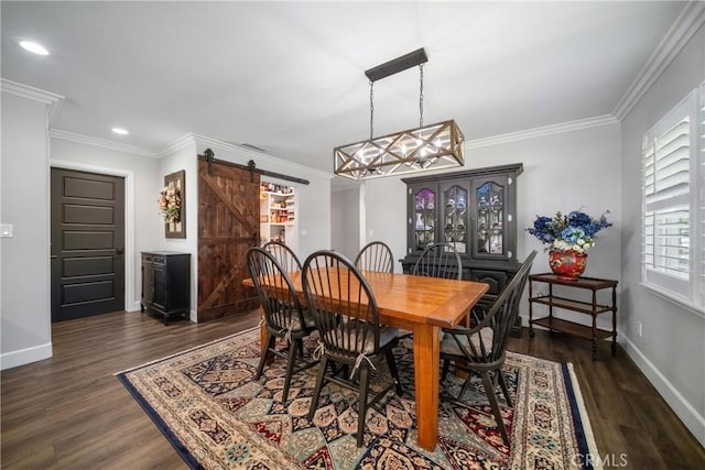 780 S Briargate Ln, Covina, CA 91723 - dining space with a barn door, dark wood finished floors, recessed lighting, and ornamental molding