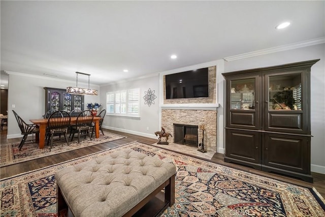 780 S Briargate Ln, Covina, CA 91723 - living area with wood finished floors, crown molding, a fireplace, and recessed lighting