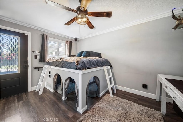 780 S Briargate Ln, Covina, CA 91723 - laundry room with dark wood-style flooring, a ceiling fan, and crown molding