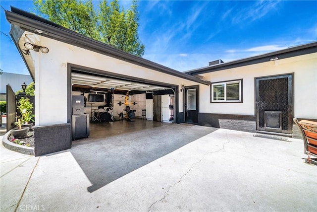 780 S Briargate Ln, Covina, CA 91723 - view of patio with concrete driveway and an attached garage