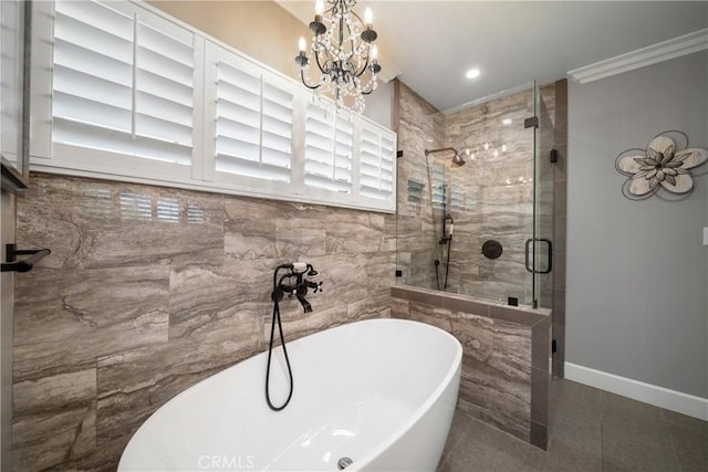 780 S Briargate Ln, Covina, CA 91723 - full bathroom featuring a soaking tub, a stall shower, tile patterned flooring, crown molding, and tile walls