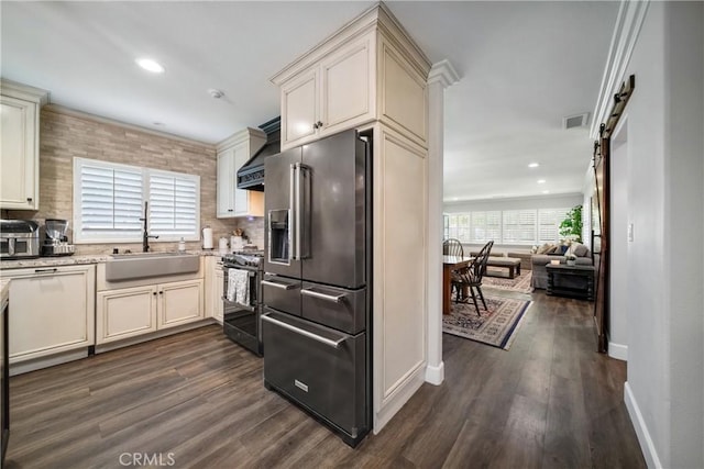 780 S Briargate Ln, Covina, CA 91723 - kitchen featuring high end refrigerator, stainless steel gas range oven, dark wood-type flooring, backsplash, and recessed lighting