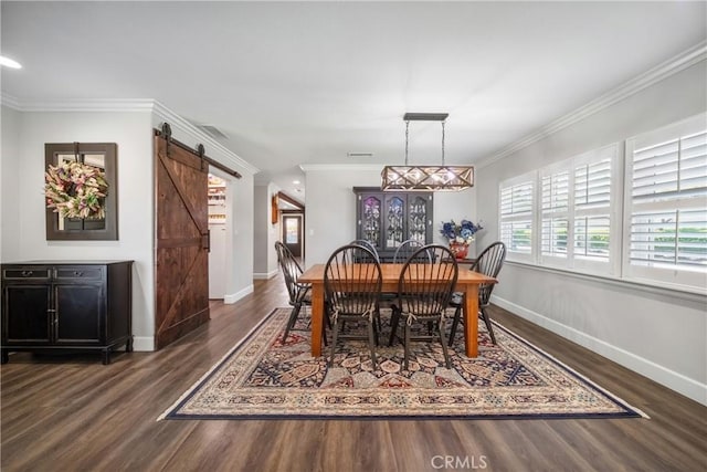 780 S Briargate Ln, Covina, CA 91723 - dining area featuring wood finished floors, a barn door, and ornamental molding
