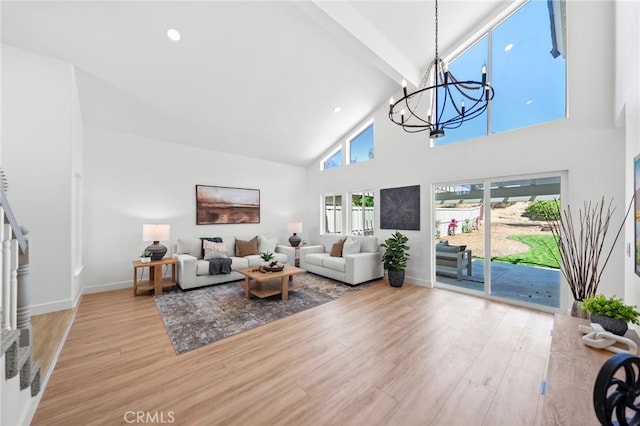 41442 Avenida De La Reina, Temecula, CA 92592 - living room featuring a chandelier, beam ceiling, high vaulted ceiling, wood finished floors, and recessed lighting