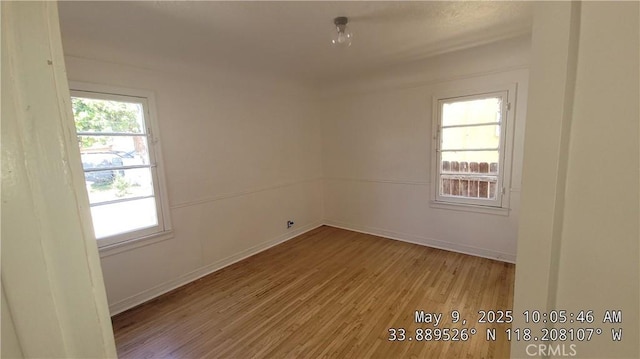 805 S Crane Ave, Compton, CA 90221 - spare room featuring light wood finished floors and baseboards
