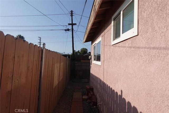 1063 Quarry St, Corona, CA 92879 - view of side of home with stucco siding