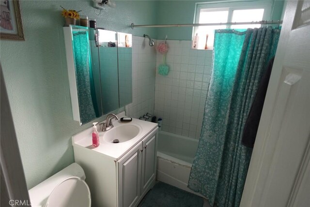 1063 Quarry St, Corona, CA 92879 - full bath with shower / tub combo with curtain, vanity, and a textured wall