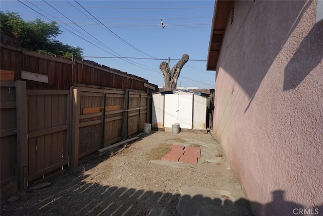 1063 Quarry St, Corona, CA 92879 - fenced backyard with a storage shed