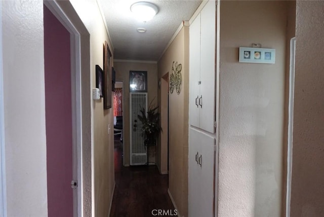 1063 Quarry St, Corona, CA 92879 - corridor with a heating unit, dark wood-type flooring, and crown molding