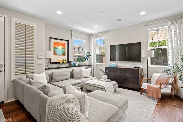 22088 Barrington Way, Saugus, CA 91350 - living area with dark wood finished floors, healthy amount of natural light, and recessed lighting