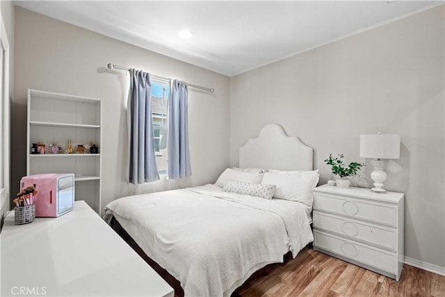 22088 Barrington Way, Saugus, CA 91350 - bedroom featuring light wood-type flooring and baseboards