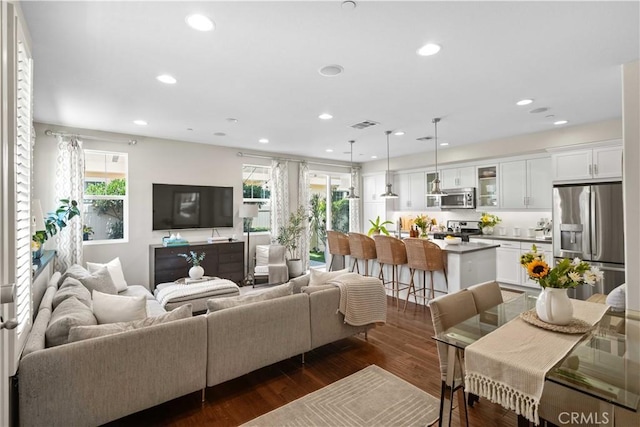 22088 Barrington Way, Saugus, CA 91350 - living room with dark wood finished floors and recessed lighting