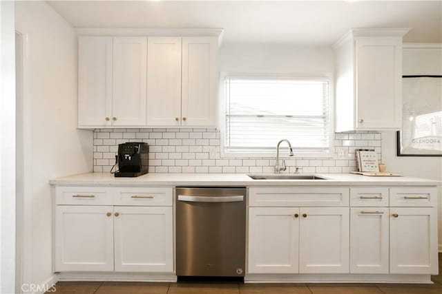 817 Caballo Ave, Glendora, CA 91740 - kitchen featuring stainless steel dishwasher, white cabinetry, decorative backsplash, and light countertops