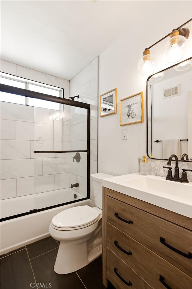 817 Caballo Ave, Glendora, CA 91740 - bathroom featuring vanity, shower / bath combination with glass door, and tile patterned floors