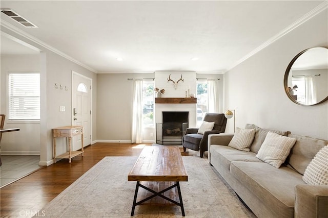 817 Caballo Ave, Glendora, CA 91740 - living room featuring light wood-style flooring, crown molding, a fireplace, and recessed lighting