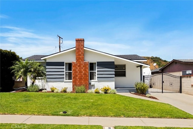 817 Caballo Ave, Glendora, CA 91740 - view of front of house featuring a gate, a front yard, stucco siding, a chimney, and concrete driveway