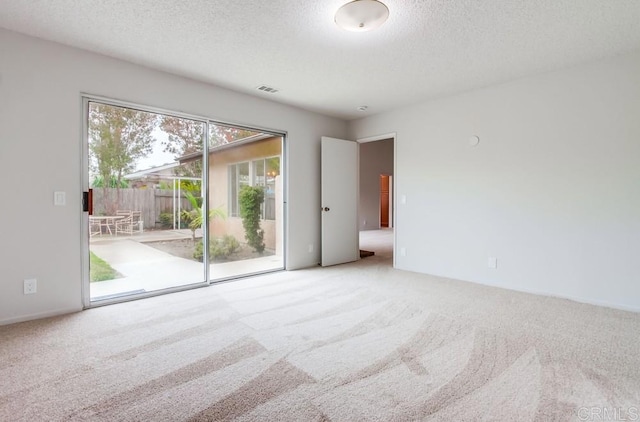 3694 Branch Ct, Oceanside, CA 92058 - carpeted empty room featuring a textured ceiling
