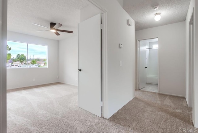 3694 Branch Ct, Oceanside, CA 92058 - carpeted empty room featuring a textured ceiling and ceiling fan