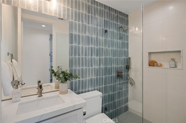 1700 Perkins Ln, Redondo Beach, CA 90278 - full bath featuring tile walls, a tile shower, vanity, and recessed lighting