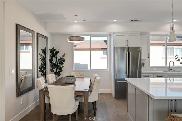 1700 Perkins Ln, Redondo Beach, CA 90278 - dining area with light wood-style flooring and recessed lighting