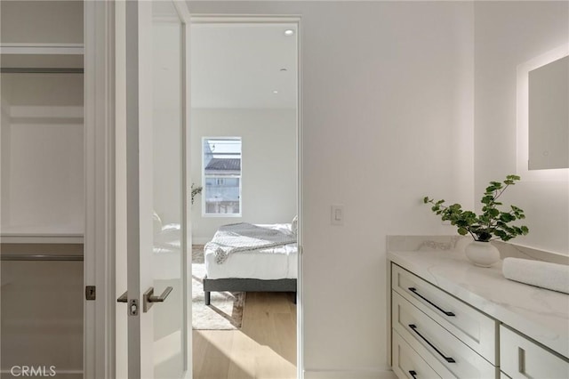 1700 Perkins Ln, Redondo Beach, CA 90278 - ensuite bathroom featuring vanity and wood finished floors