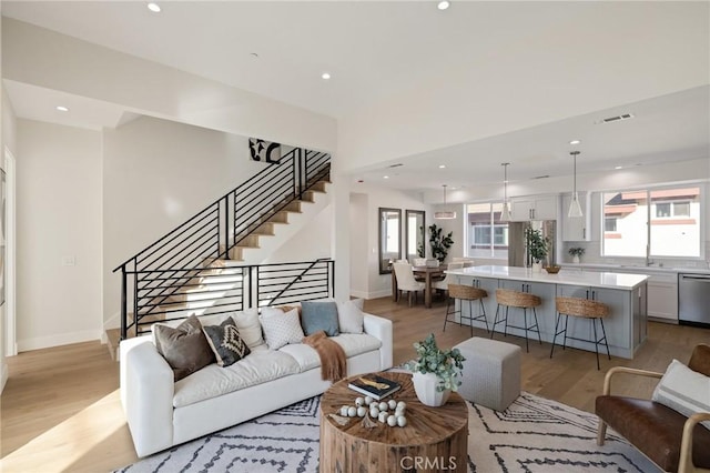 1700 Perkins Ln, Redondo Beach, CA 90278 - living area with light wood-style floors, stairs, and recessed lighting