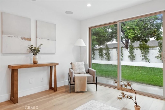 1147 Charleston St, Costa Mesa, CA 92626 - living area featuring wood finished floors and recessed lighting